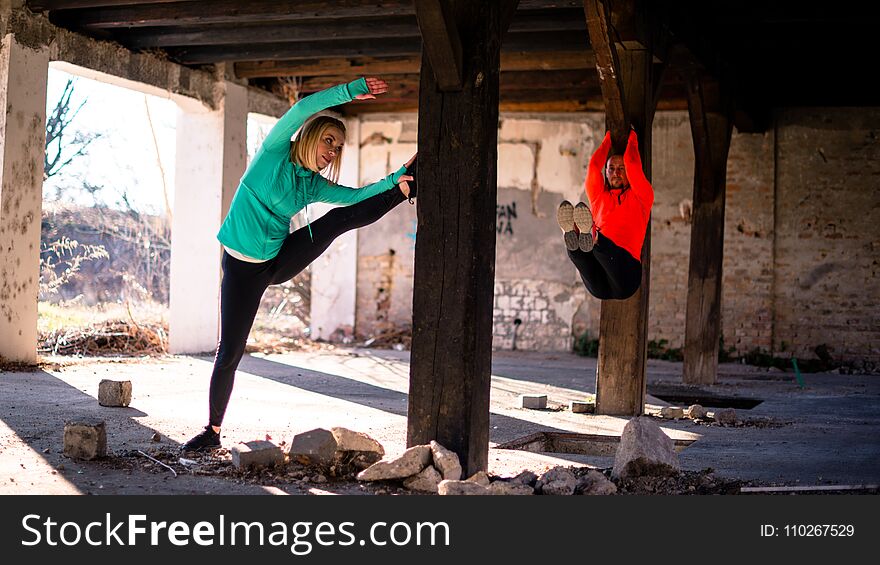 Man And Woman Exercising Together