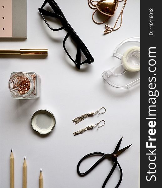 Top-view Photography of White Wooden Table With Personal Accessories on Top