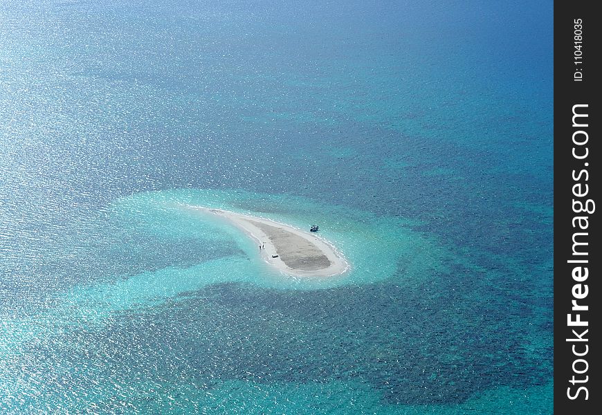 Oval White Sand Island at Daytime