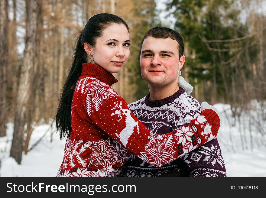 Woman in Red and White Christmas Theme Sweater