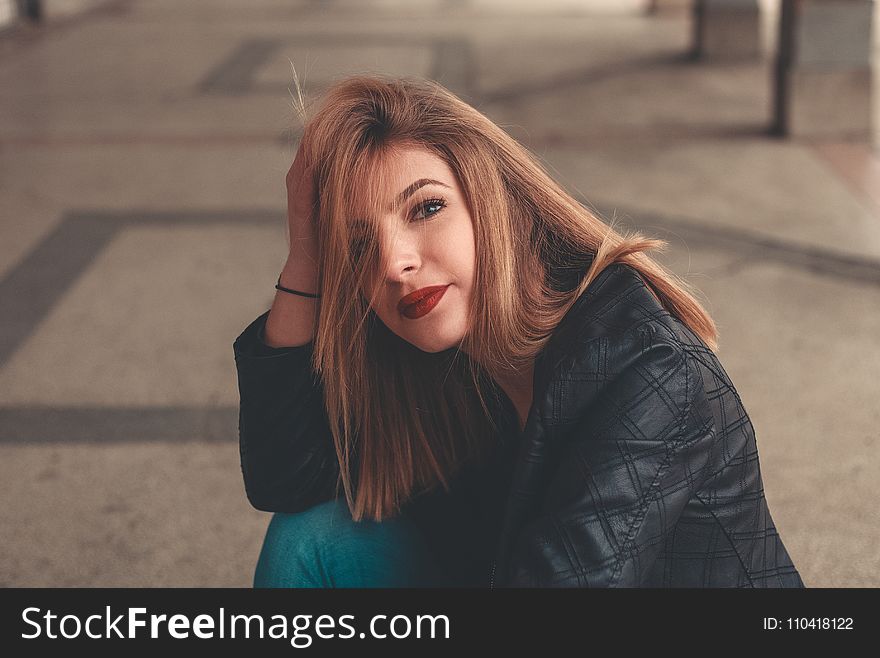 Woman in Black Leather Jacket Smiling