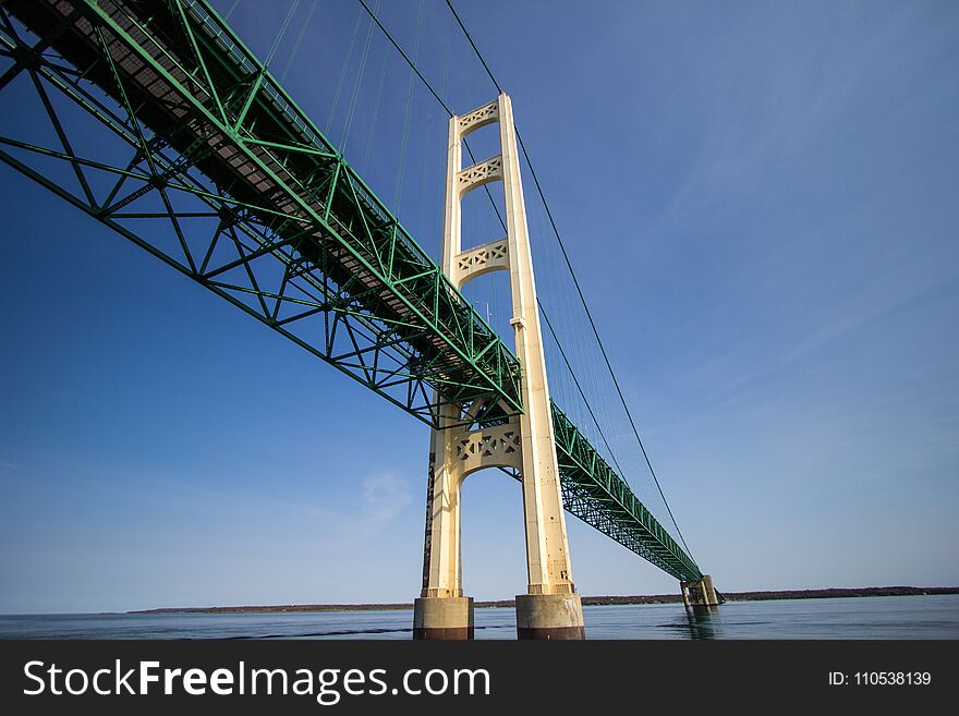 Close up view of the center span of the Mackinaw Bridge in Michigan, The Mackinaw is one of the longest suspension bridges in the world and part of Interstate 75. Close up view of the center span of the Mackinaw Bridge in Michigan, The Mackinaw is one of the longest suspension bridges in the world and part of Interstate 75