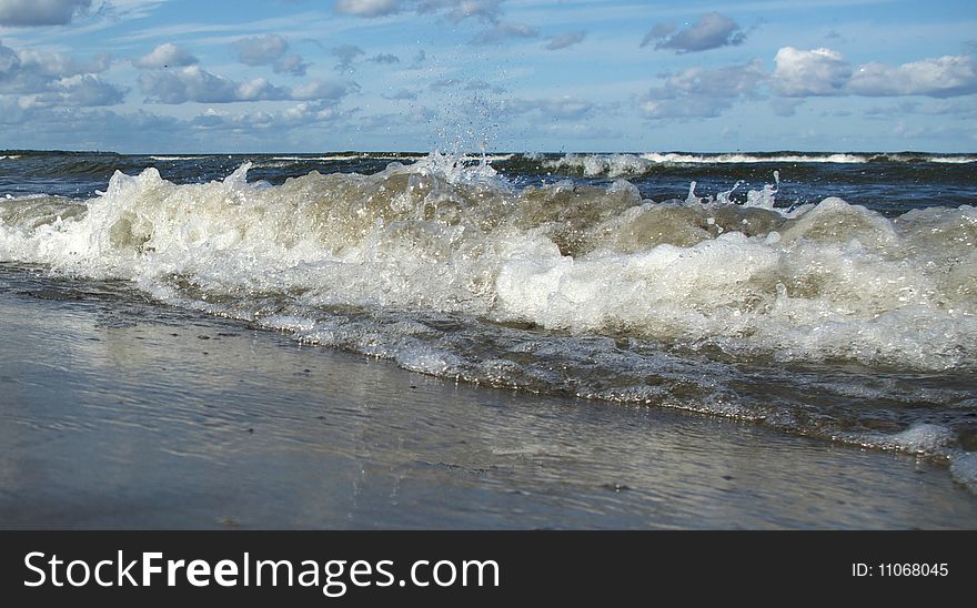 Waves in the sea on blue sky. Waves in the sea on blue sky.