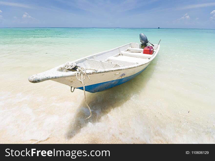 Beautiful beach with boat, perhentian islands in malaysia