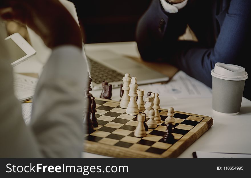 Person Playing Chessboard Set