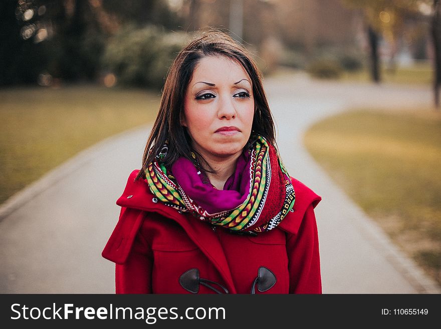 Woman Wearing Red Coat And Scarf