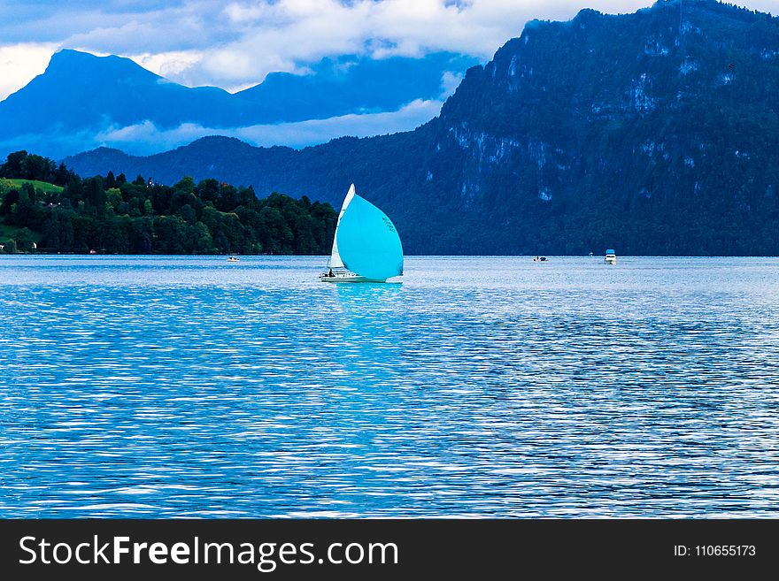 Sailing Boat on Body of Water