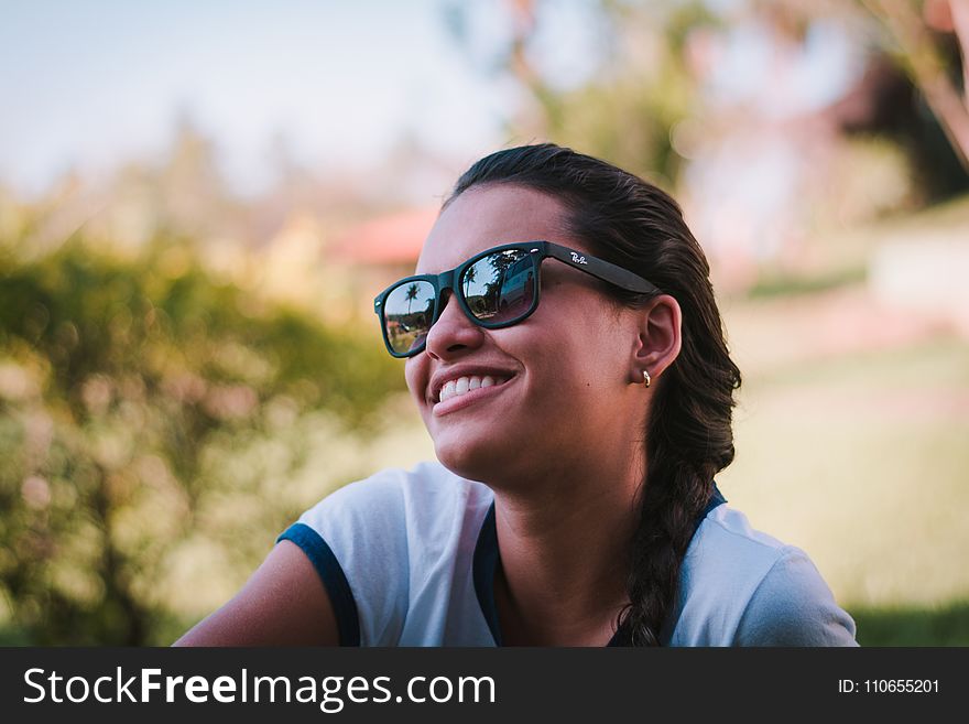Woman Wearing Black Ray-ban Sunglasses