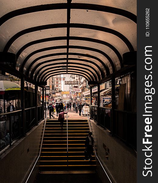 Human In Red Top Walking On Stair