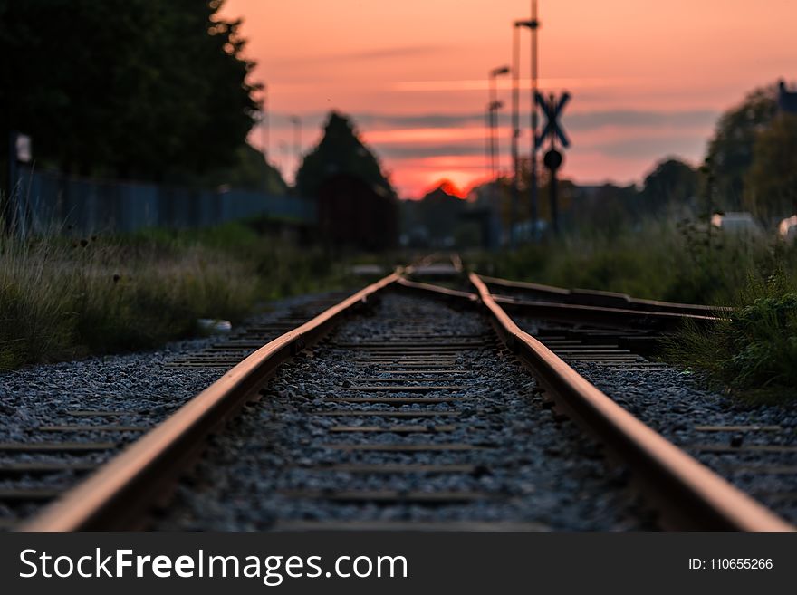 Shallow Focus Photography of Railway during Sunset