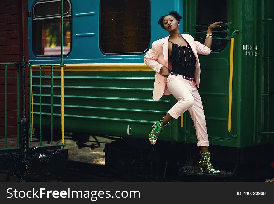 Woman Wearing Pink Blazer And Pants