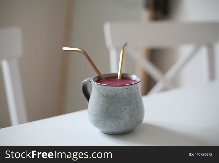 Gray Ceramic Mug With Pink Beverage