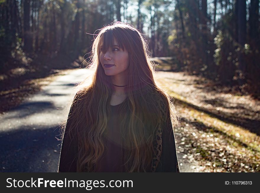 Photo of a Woman in the Forest