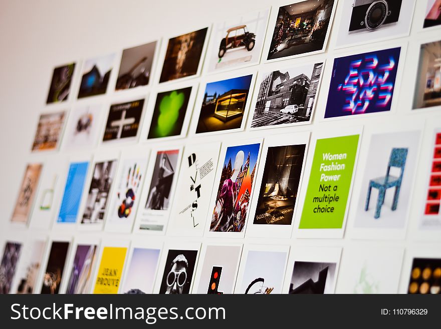 Close-up Photography of Photographs on the Wall