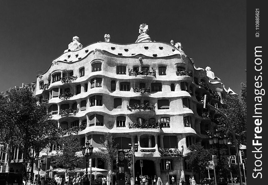 White Concrete Building in Grayscale Photography