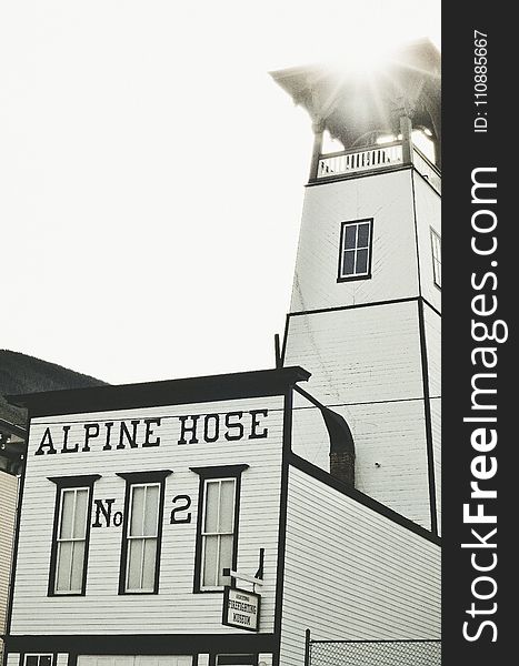 White and Black Alpine Hose Building