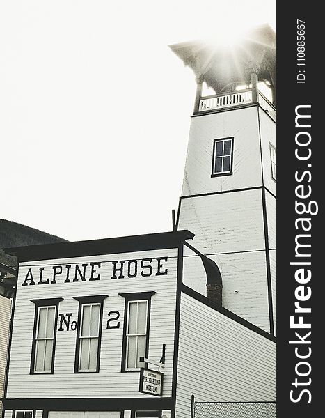 White And Black Alpine Hose Building