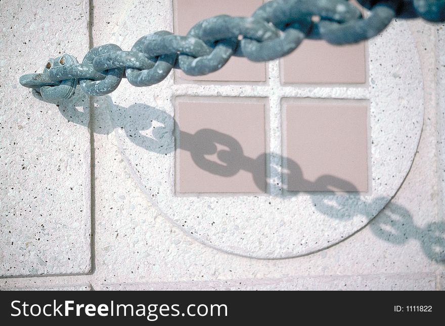 Chain And Ceramic Tile Detail