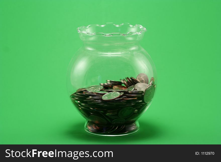Isolated jar of coin... rich... rich... rich...