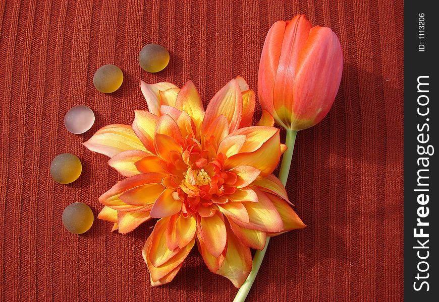 Orange Tulip, Artificial Orange Flower & Glass Pebbles. Orange Tulip, Artificial Orange Flower & Glass Pebbles