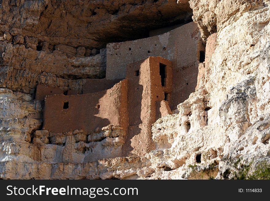Historic Sinagua Native Indian ruins called the Montazuma Castle in Arizona USA. Carved in Red Rock