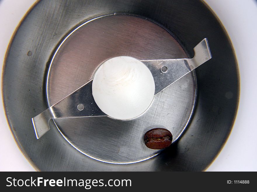 A single coffee bean is all that is left to grind in this appliance. A single coffee bean is all that is left to grind in this appliance.