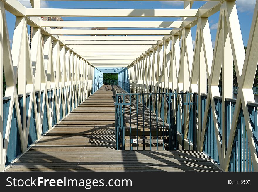 A bridge  with upper and lower converging lines. A bridge  with upper and lower converging lines