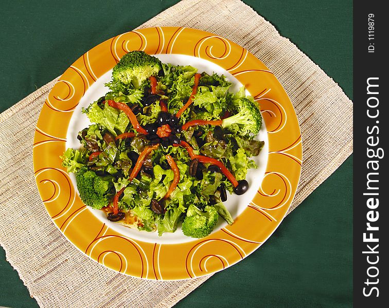 Fresh mixed salad with broccoli and black olives. Fresh mixed salad with broccoli and black olives