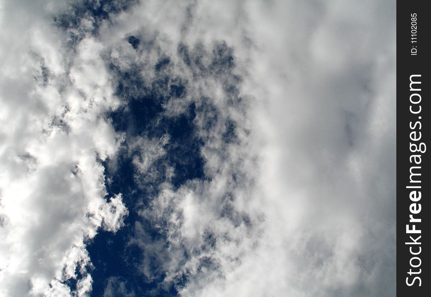 A dramatic summer cloudscape scene. A dramatic summer cloudscape scene