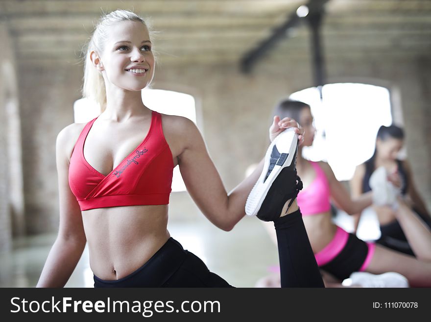 Woman Wearing Red Bralette