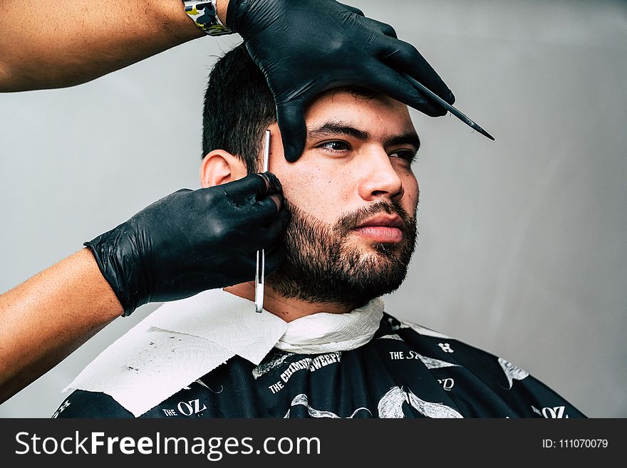 Man Taking Beard Shave