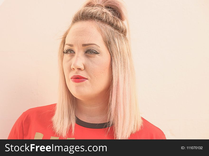 Woman With Tied Hair Wearing Red Top