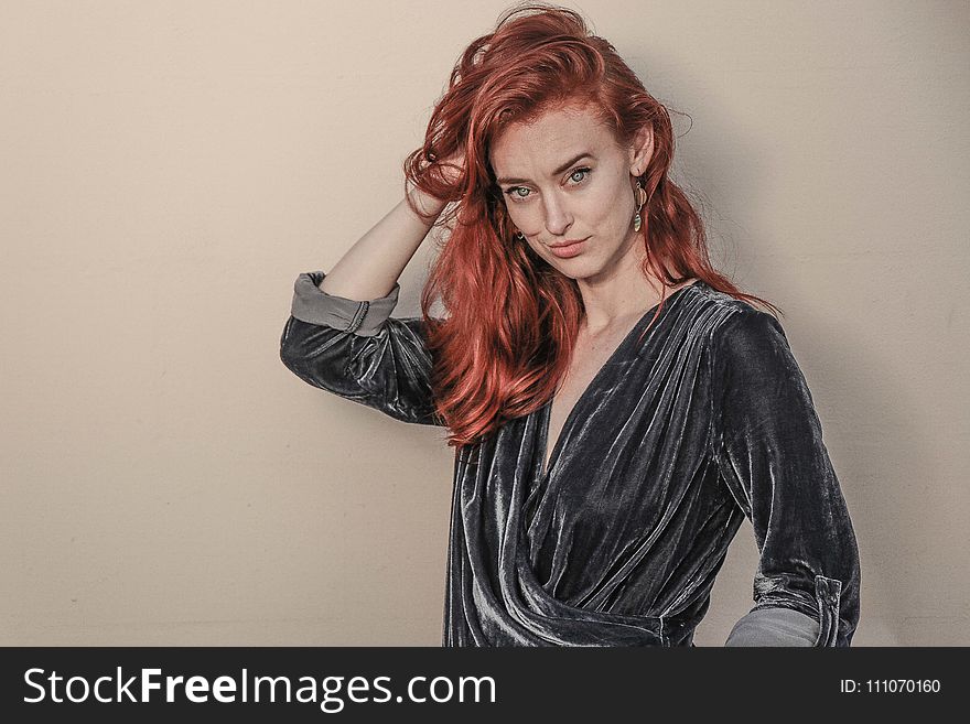 Red Haired Woman in Black Long-sleeved Top