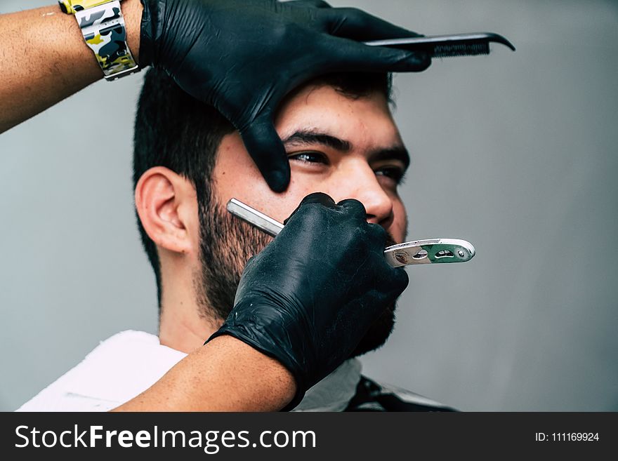 Person Shaving a Man&#x27;s Face With Straight Razor