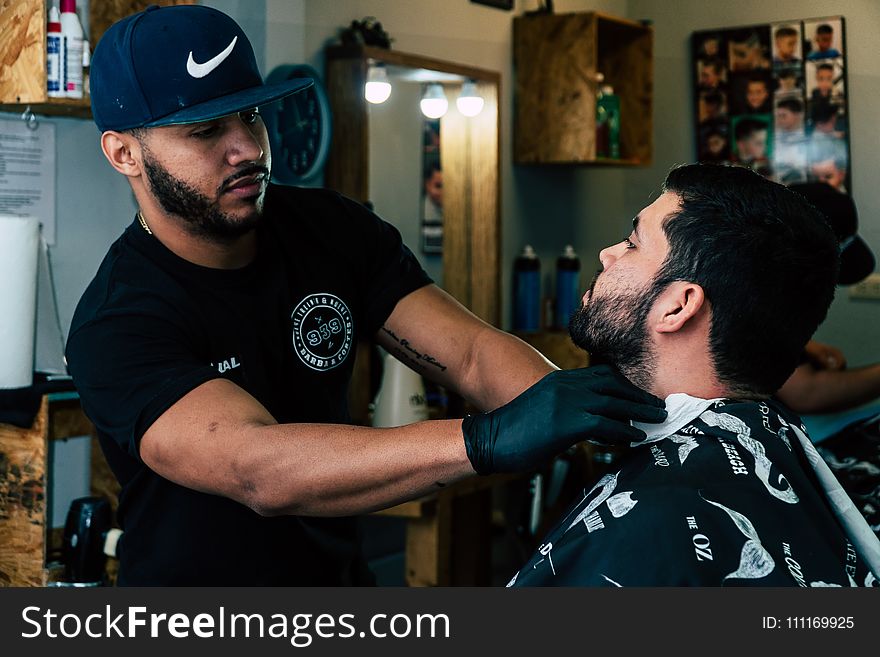 Barber Shaving His Costumer