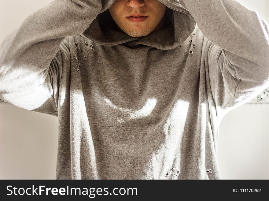Man Wearing Gray Hoodie