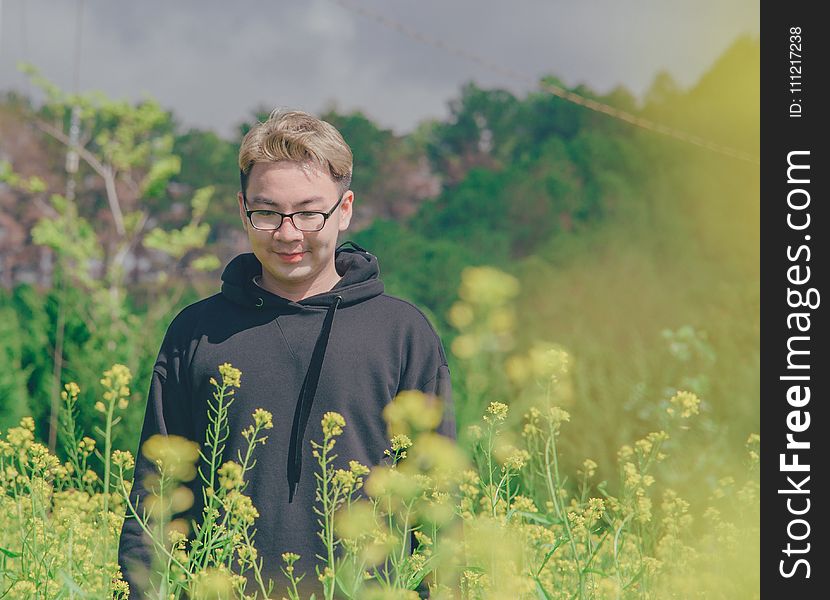 Shallow Focus Photography Of Man In Black Pullover