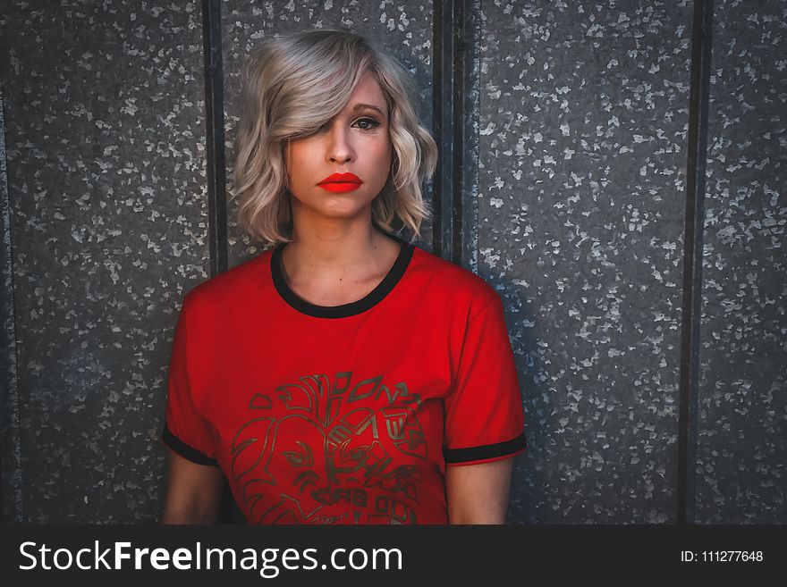 Woman Wearing Red Shirt With Red Lipstick