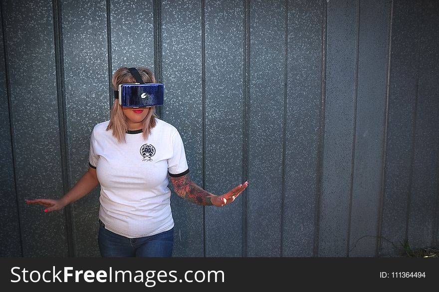 Photo of Woman Wearing Virtual Reality Headset