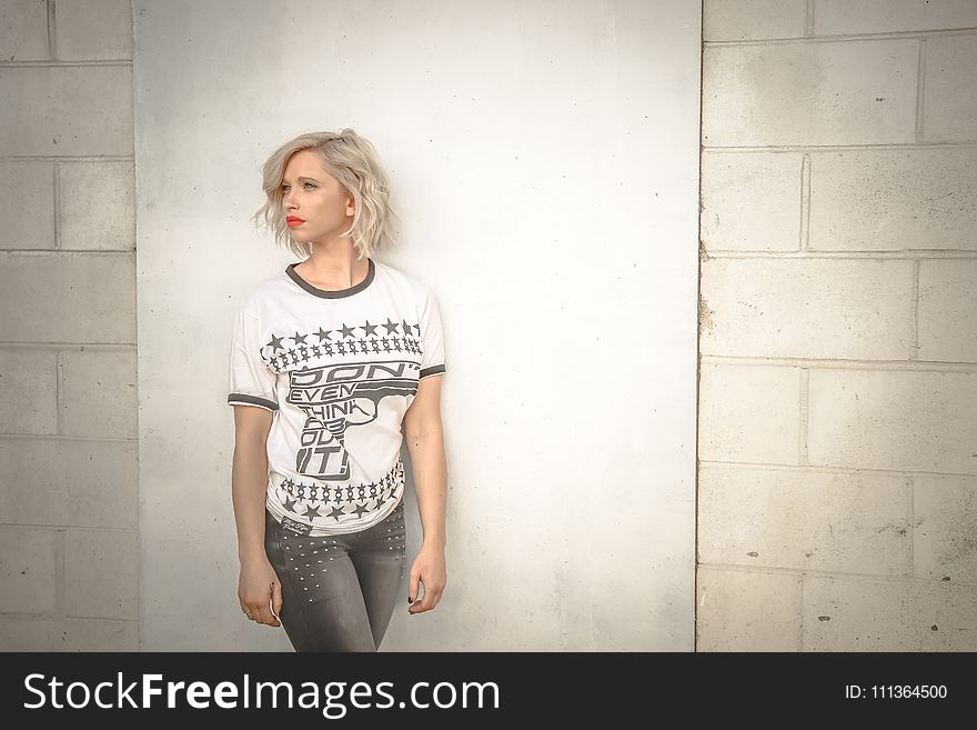 Photography Of A Woman Wearing White T-Shirt