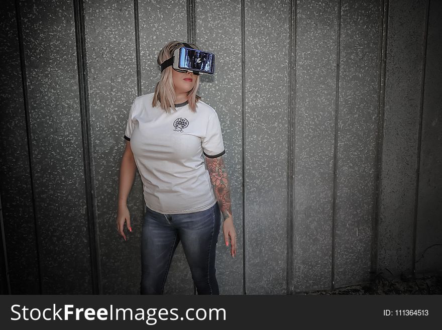 Photo of Woman Using Virtual Reality Headset