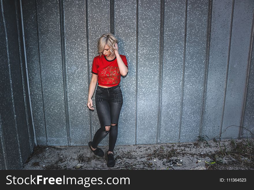 Photo of Woman in Red Crew Neck T-shirt