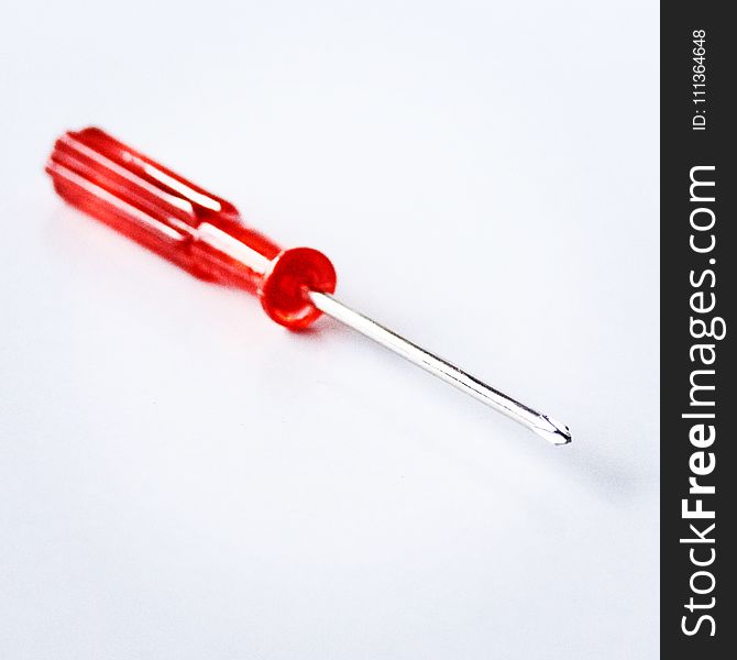 Close-Up Photography of Red Screwdriver