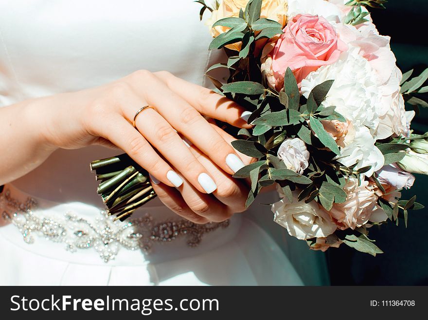 Woman Holding White and Pink Roses Bouquet