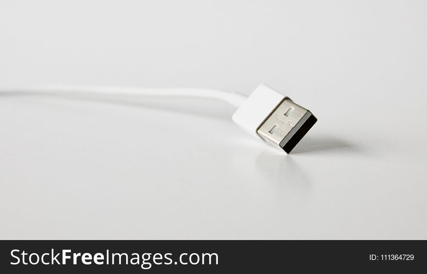 Close-Up Photo of White Usb Cable