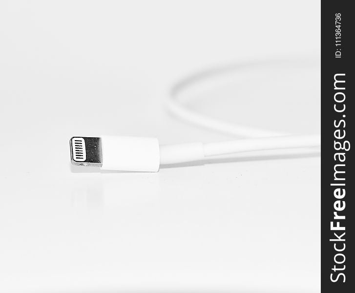 Close-Up Photography of White iPhone Charger