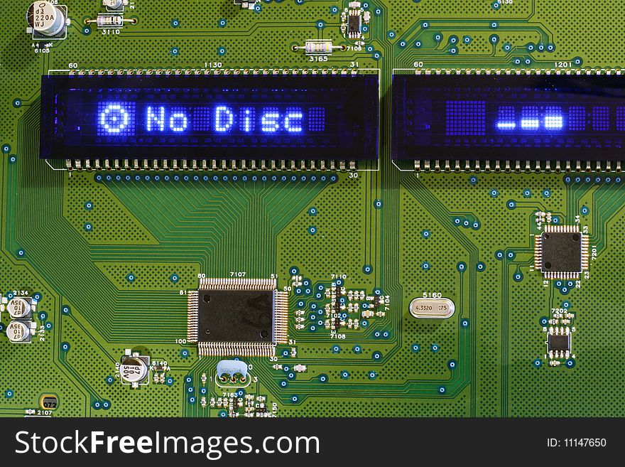 Printed circuit board with blue display. Message No Disc. Printed circuit board with blue display. Message No Disc.