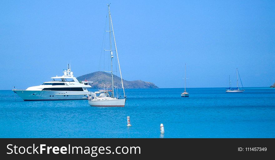 Body of Water and White Yacht