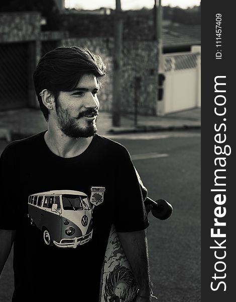 Grayscale Photography of a Man Wearing Black Crew-neck Shirt