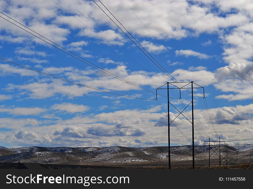 Electric Tower Under Cloudy Sky